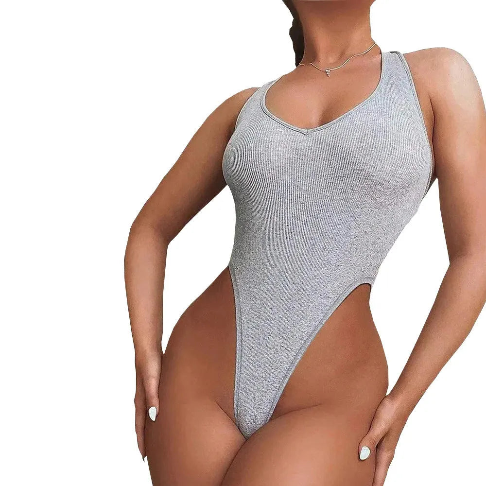 Grey viscose women's jumpsuit with halter neck, suspenders, high waist, and shorts