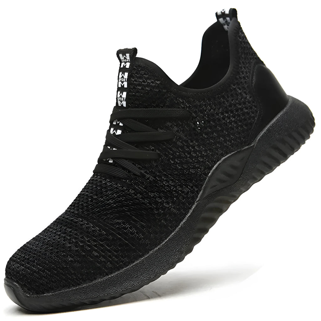 Low-cut black safety shoes with a steel toe cap on a plain background.
