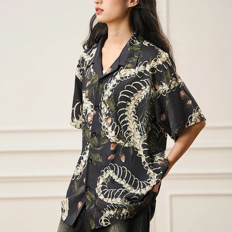 Short sleeve Cuban collar shirt with a snake bone and floral printed pattern in a loose fit.
