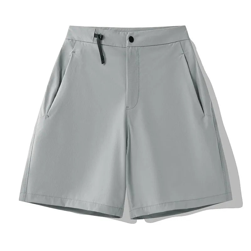 Men's quick-drying sports shorts in Army Green colour with elastic waistband, shown flat.
