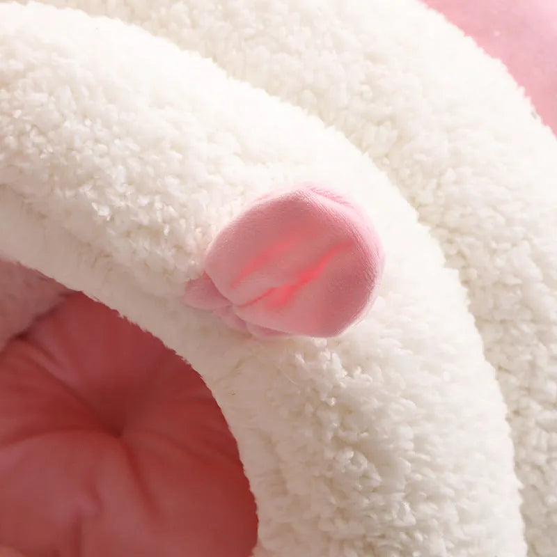 Blue enclosed cat nest with a soft fleece interior and a removable cushion, shown next to a ruler indicating its 40cm by 50cm size.