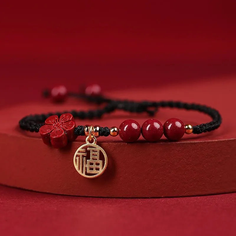 Cinnabar bracelet with braided rope and peach blossom charm for exam luck