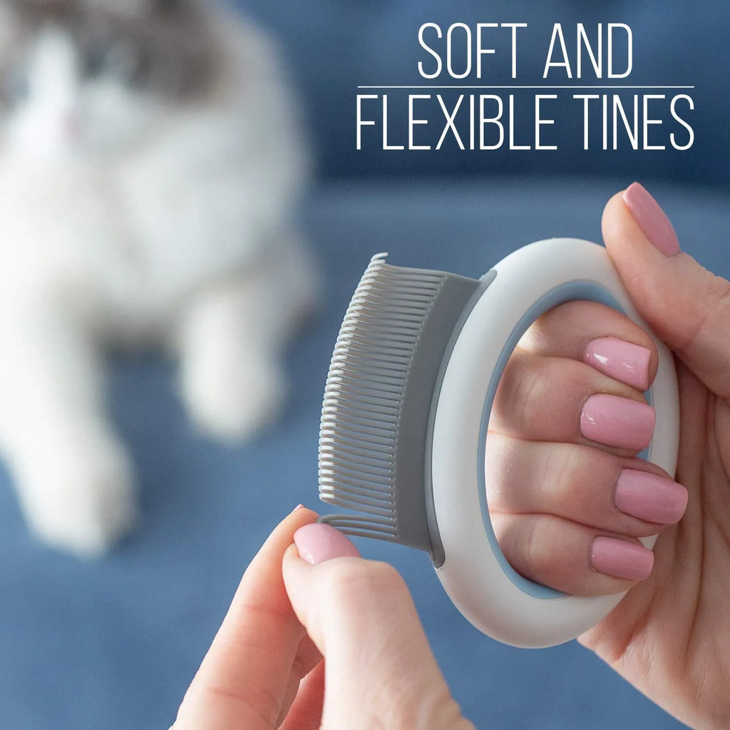 Blue ergonomic pet deshedding comb for cats and dogs on a white background.