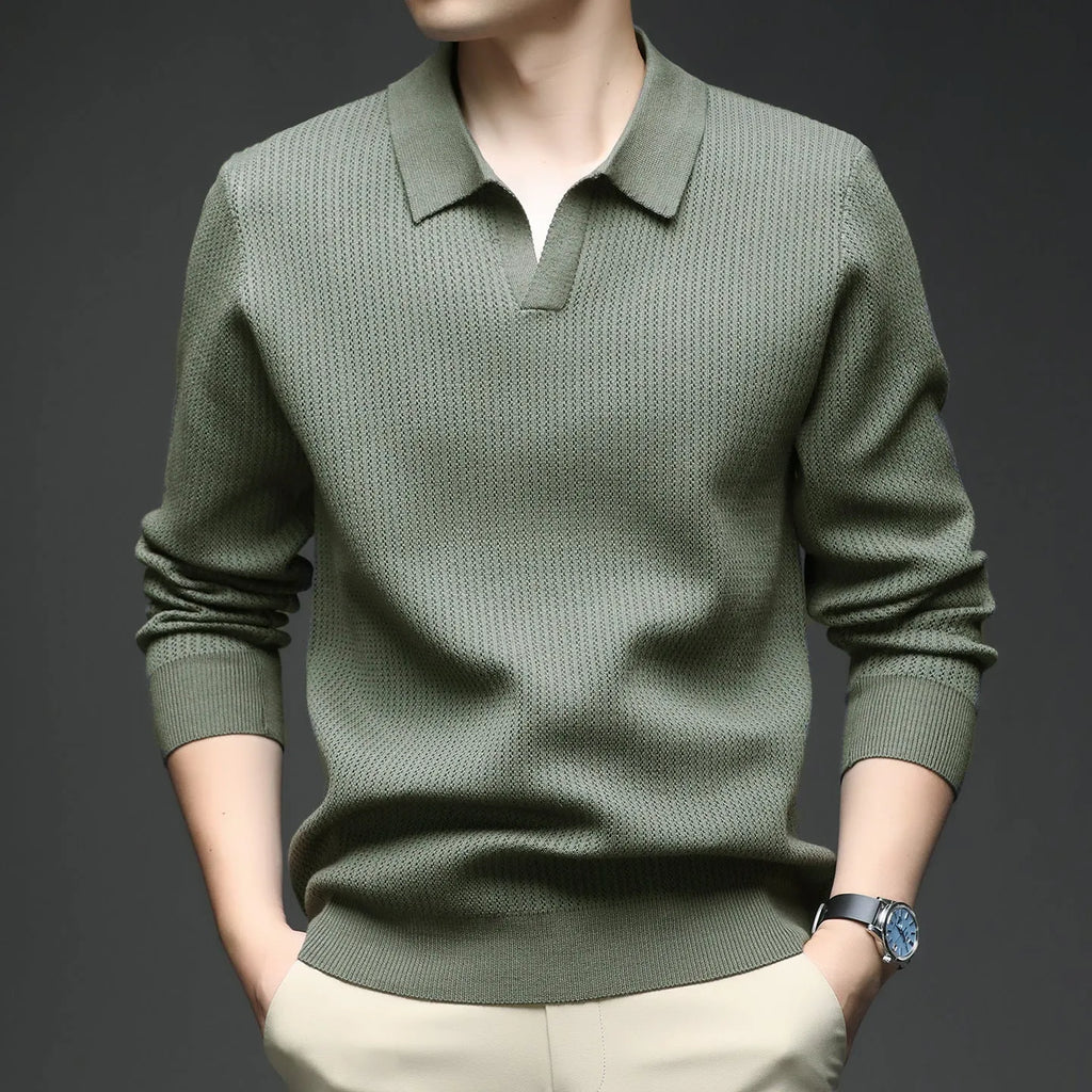 Man modelling a loose-fit green casual pullover sweater for autumn.