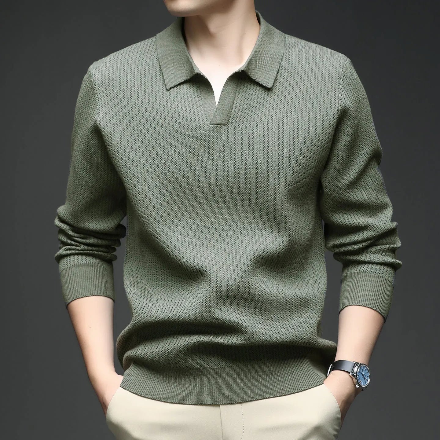 Man modelling a loose-fit green casual pullover sweater for autumn.