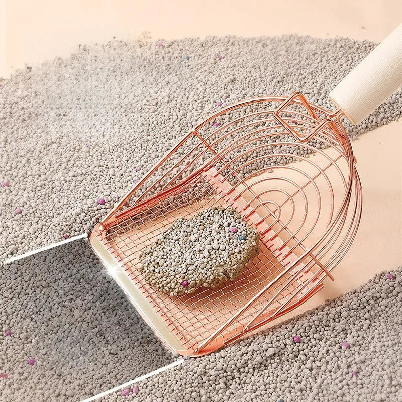Stainless steel cat litter shovel with wooden handle showing screen filtration area and sharp edges