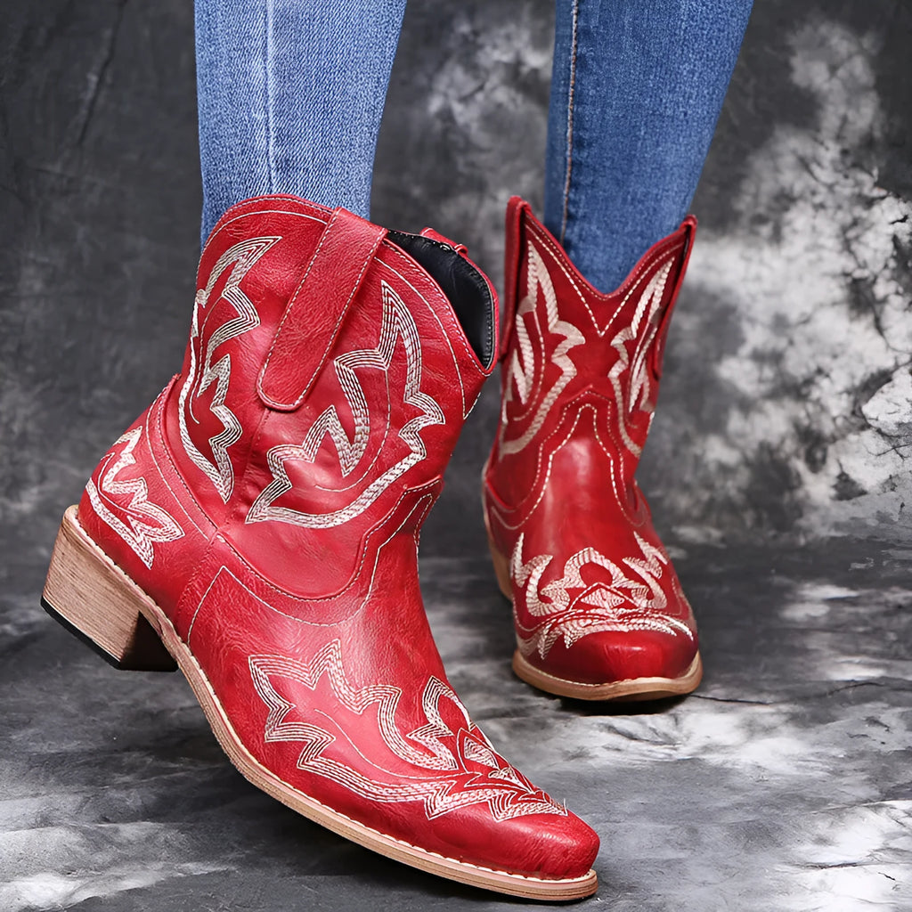 Women's blue embroidered cowboy boots with wedge heel and pointed toe