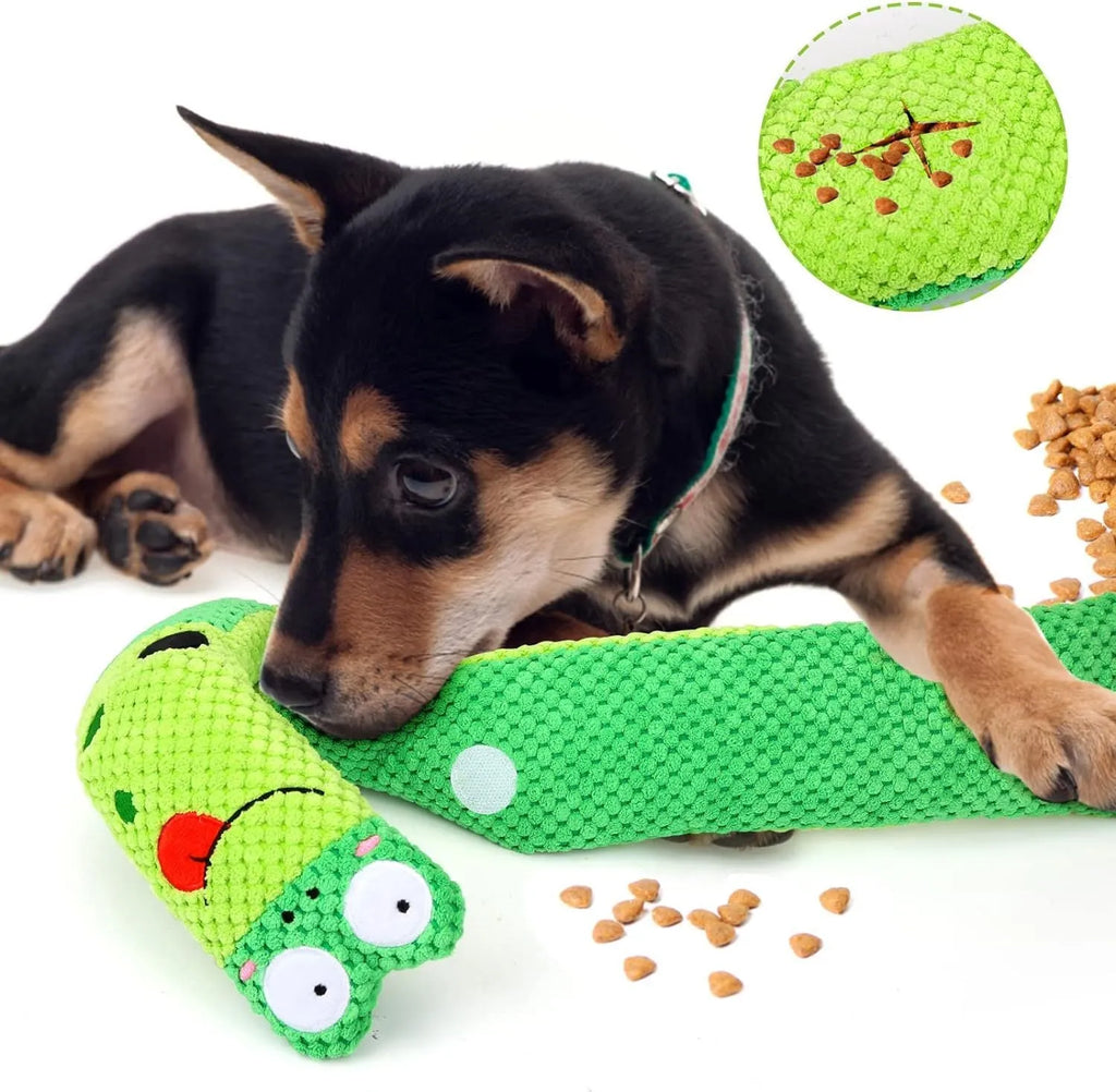 Reversible squeak dog snuffle toy in snail shape with hidden food holes, made of thick green velvet.