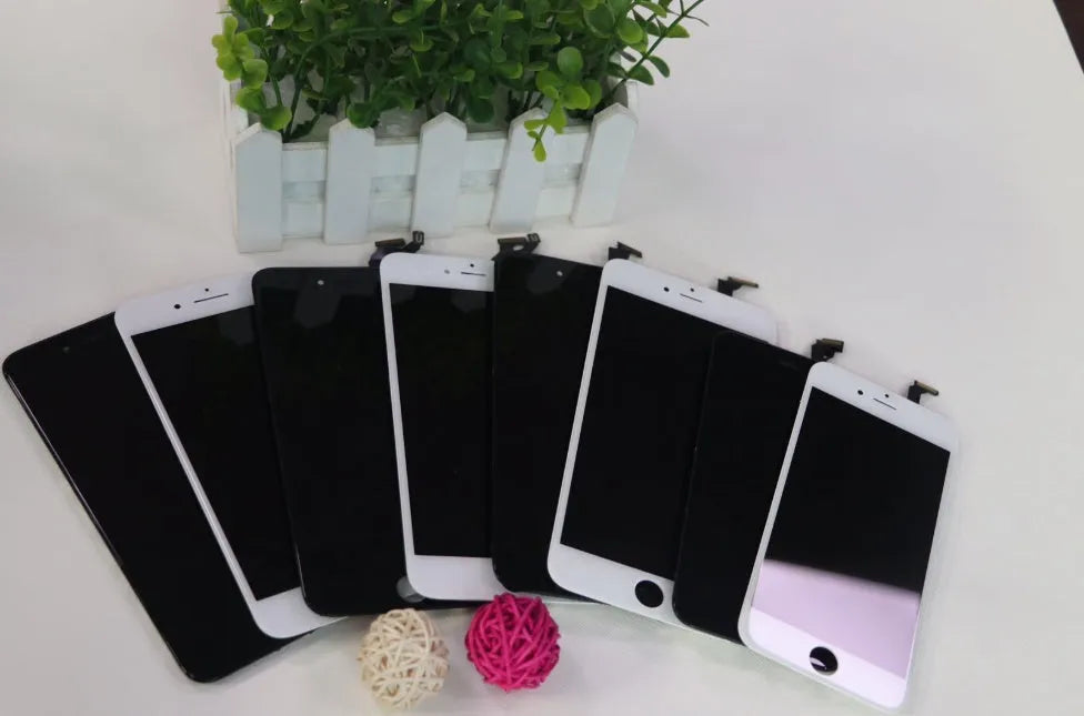 iPhone LCD touch screen replacement panel with disassembly tool and original black and white covers.