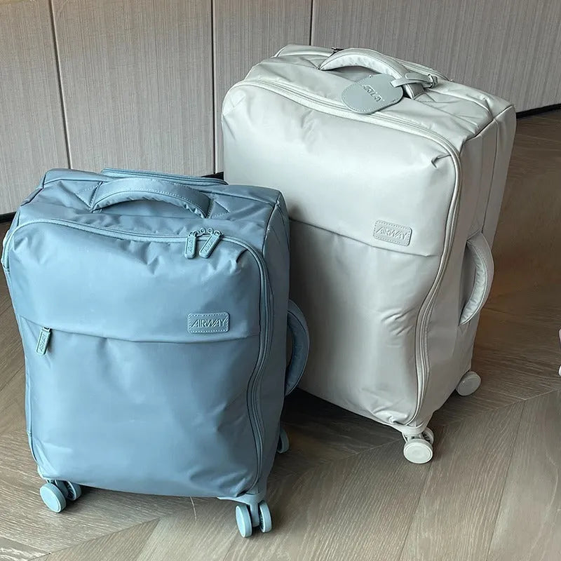 Ultra-light waterproof Oxford cloth suitcase in bluestone green colour with universal wheels