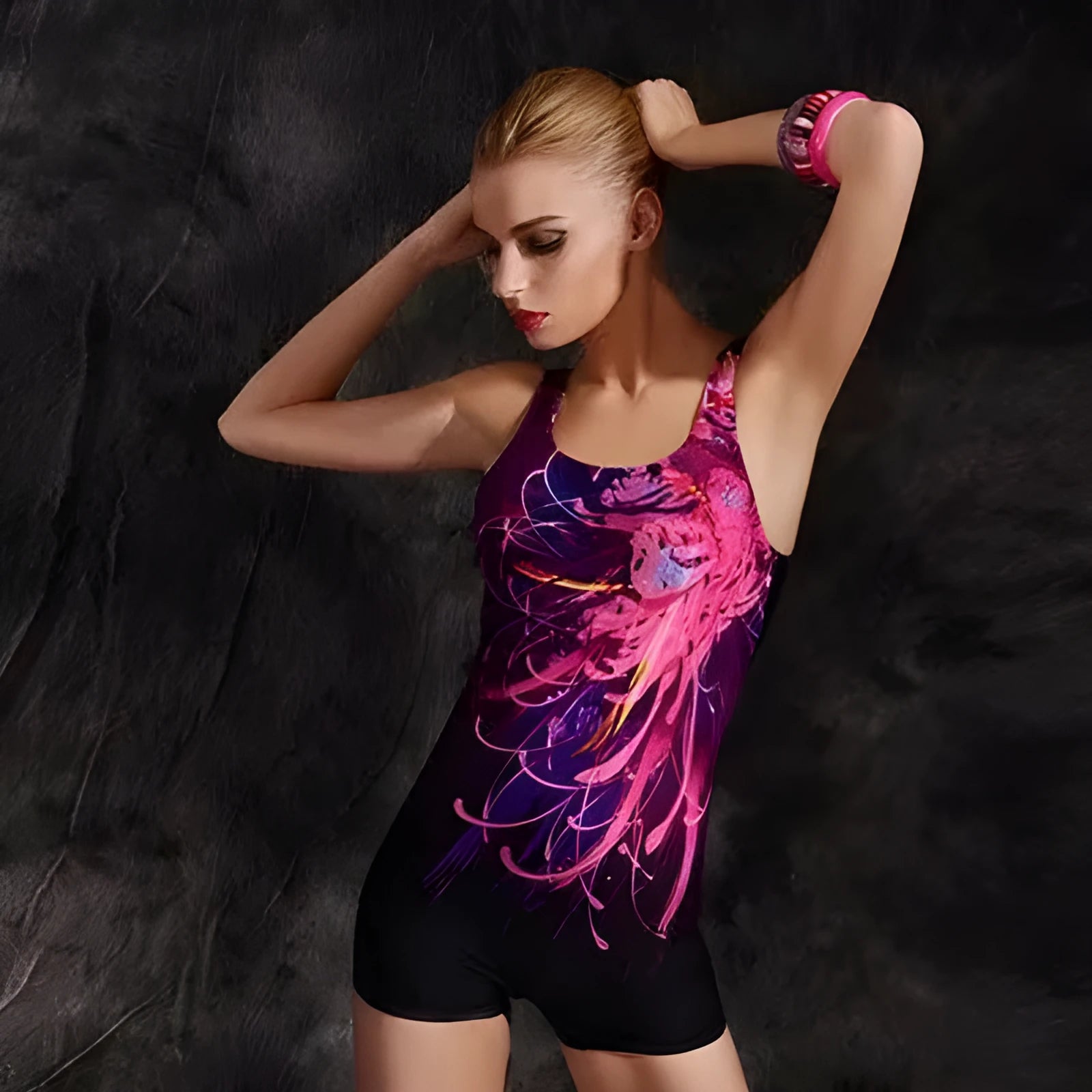 Women's one-piece swimsuit in quick-dry polyester, showing sleeveless conservative style on a mannequin.