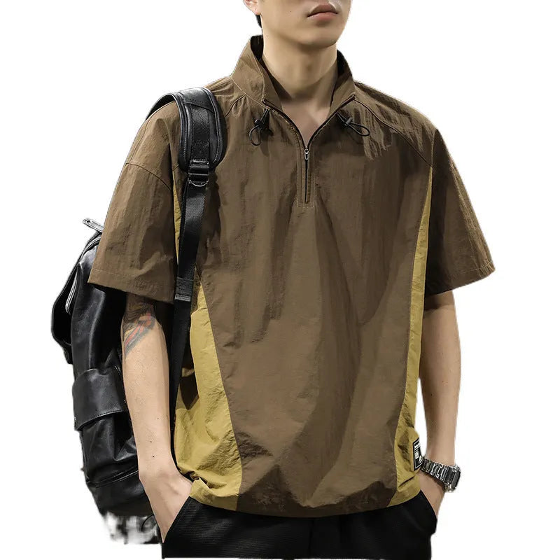 Brown men's half-zip stand collar short-sleeve shirt on a hanger, showing loose fit and ice silk fabric texture.