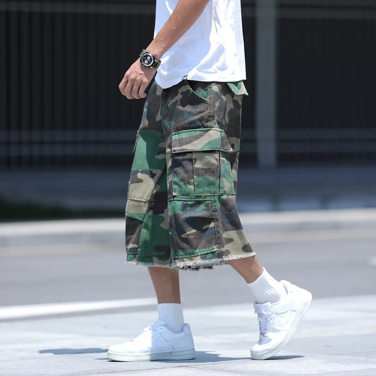 American retro workwear shorts in camouflage patterns with loose fit cropped design for summer
