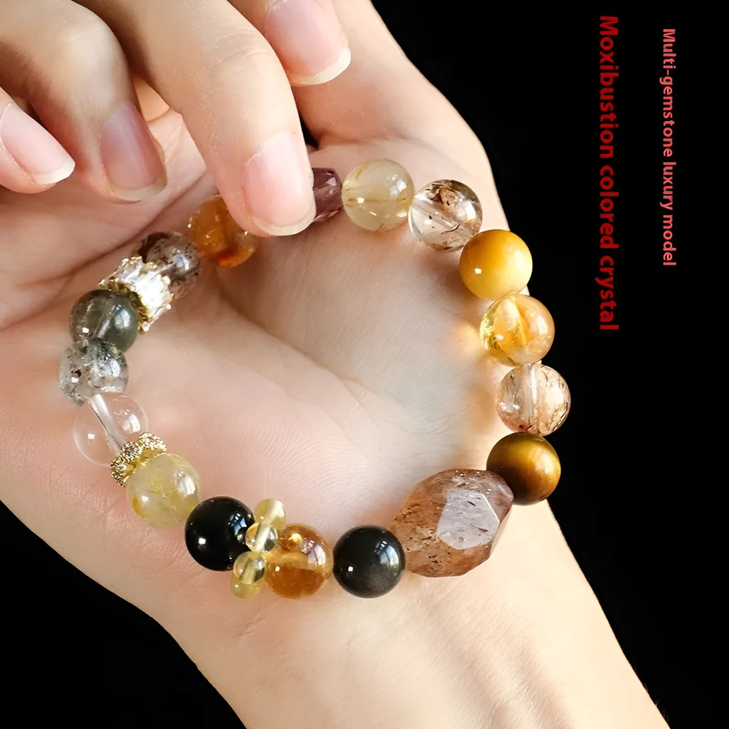 A women's bracelet featuring strands of natural Duobao crystal beads in a black and gold style.