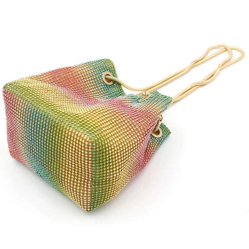 Rhinestone bucket bag in net red rainbow colours with a sparkle texture and soft construction