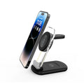 Transparent folding magnetic wireless fast charger in black on a table.