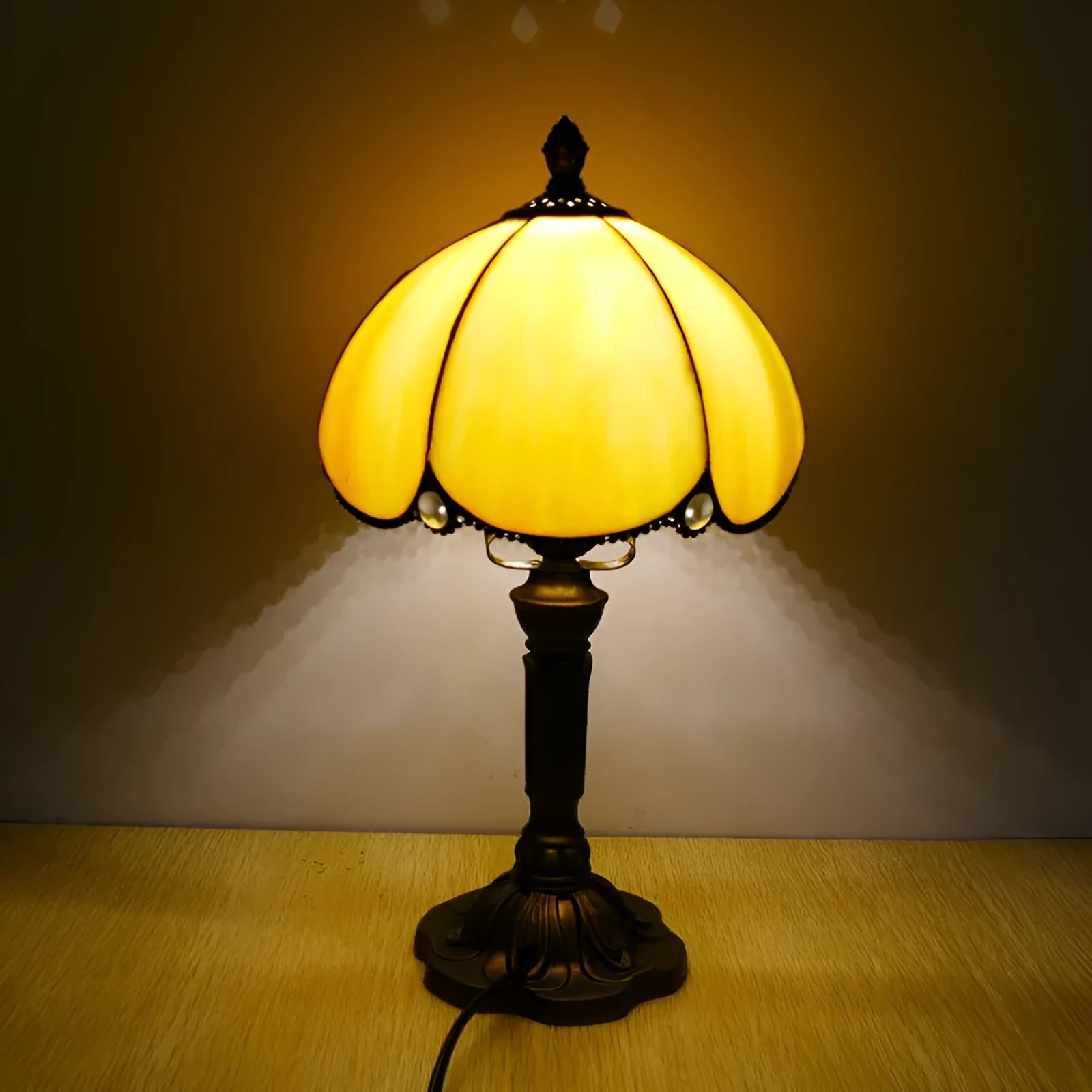 Beige fabric bedside lamp with simple modern design measuring 20cm wide