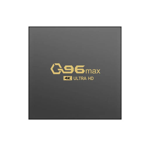 Q96 MAX S905 Android 4K TV Box set-top unit with remote control on a table.