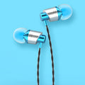 Black wired in-ear headphones with a 3.5mm plug, built-in microphone on cable, and silicone ear tips.