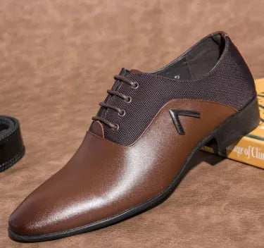 Men's black Oxford-style lace-up shoes with a low upper and rubber sole for business casual wear.