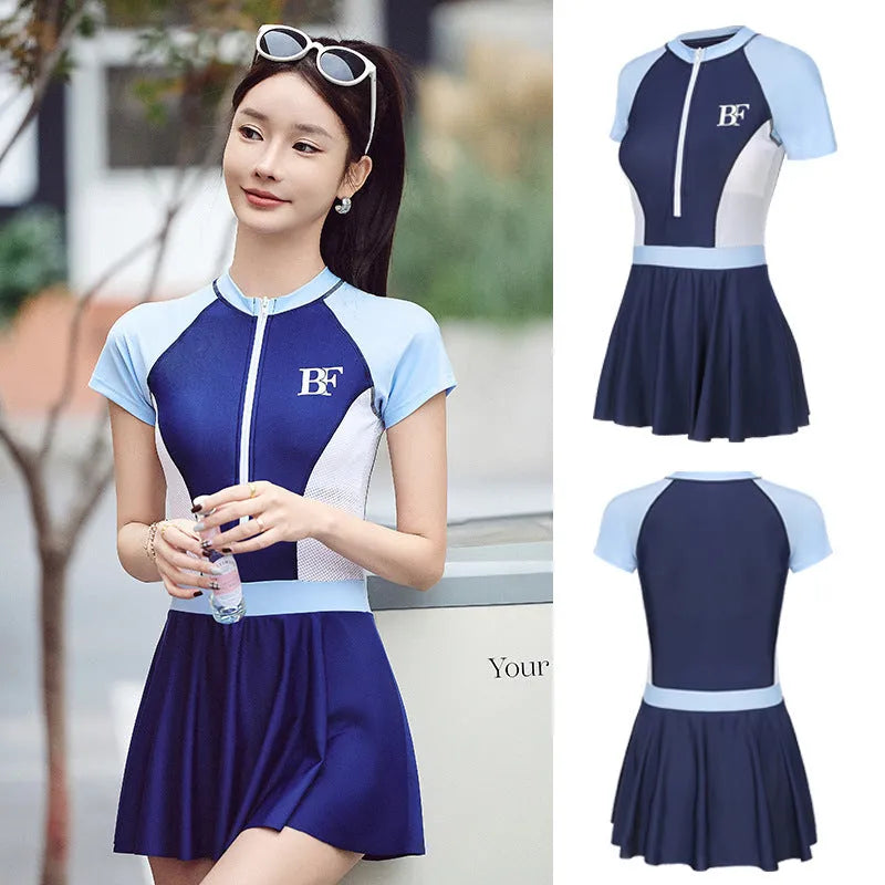 Ladies conservative style one-piece swimsuit in elastic polyester for sports.