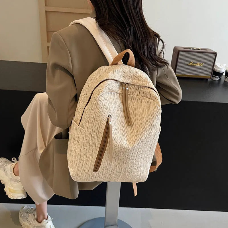 Minimalist waterproof polyester backpack in black with internal phone pocket and urban simplicity design