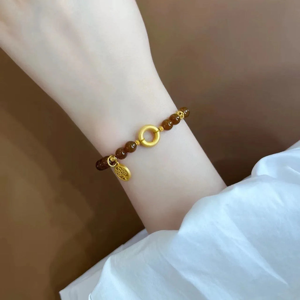 New Chinese style women's floral bracelet with lily design in caramel colour.