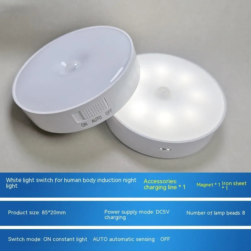 Compact round motion sensor LED night light in beige colour with USB charging cable