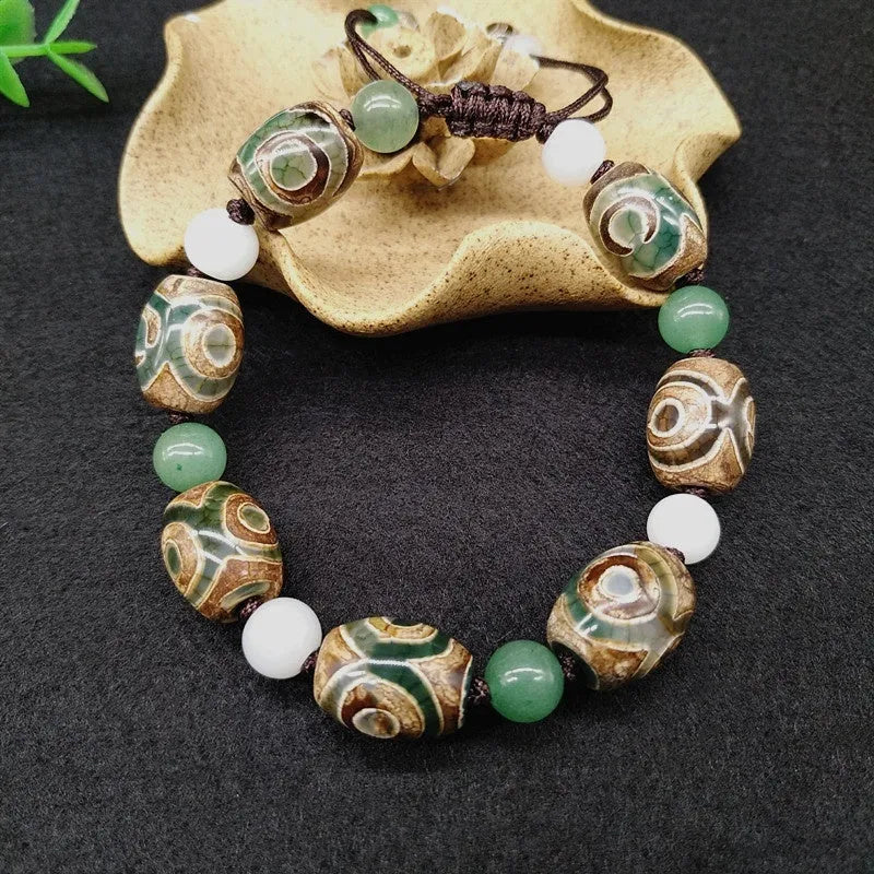 Green agate ethnic bracelet with hand-woven Tibetan beads and geometric patterns