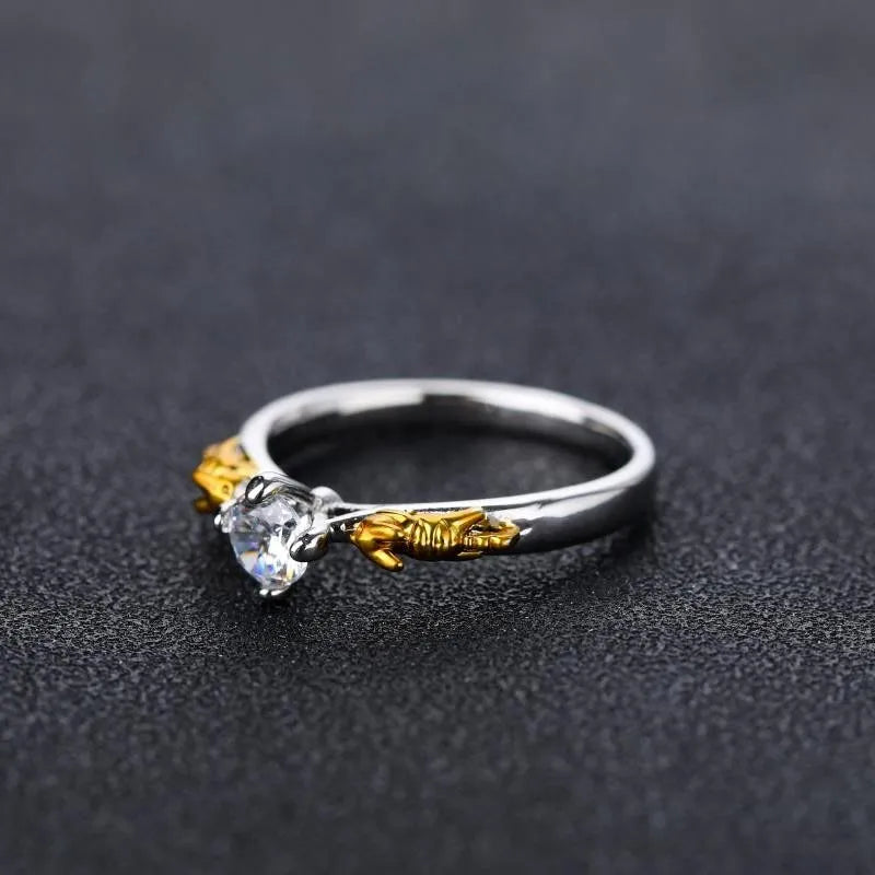 A black gold finished copper ring in a crown shape for cosplay and festivals.