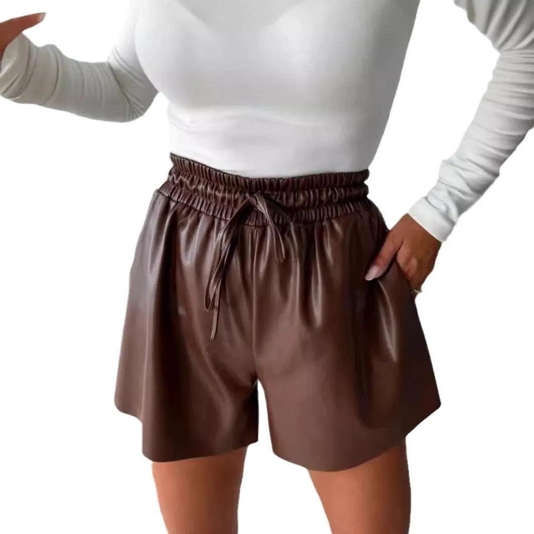 Women's black wide-leg casual shorts with front lace-up detailing and PU leather panel stitching