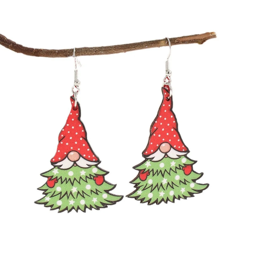 Wooden Christmas earrings with printed geometric designs featuring Christmas tree and snowman patterns