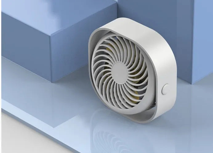 USB-powered desk fan with alarm clock in modern design, showing 360-degree rotation head in blue colour