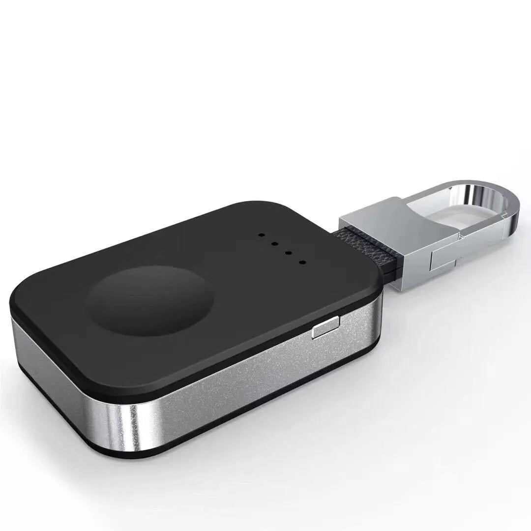 Black Apple Watch keychain power bank showing compact size and key ring attachment.