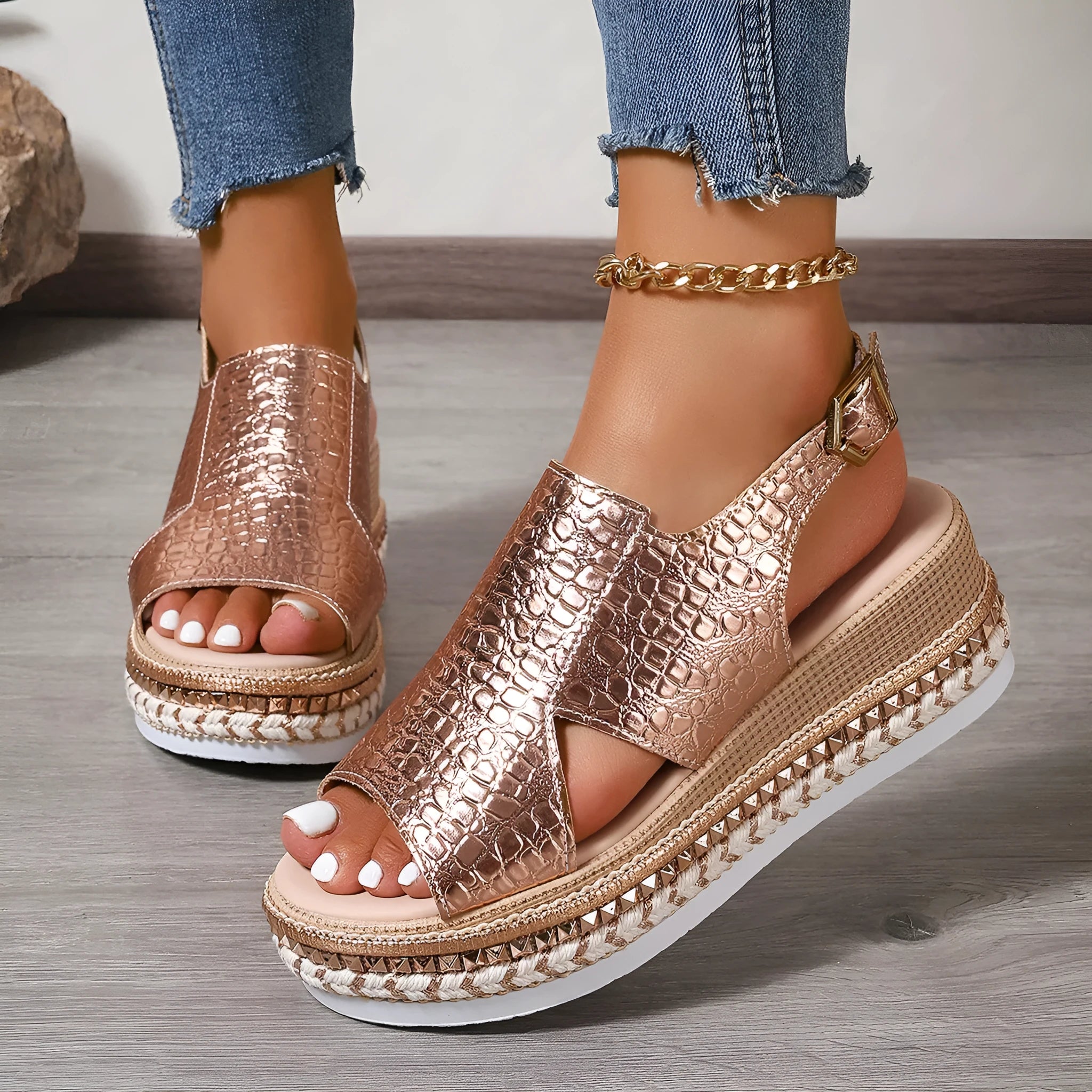 Gold Roman sandals with round toe, hollow-out pattern and adjustable ankle buckle