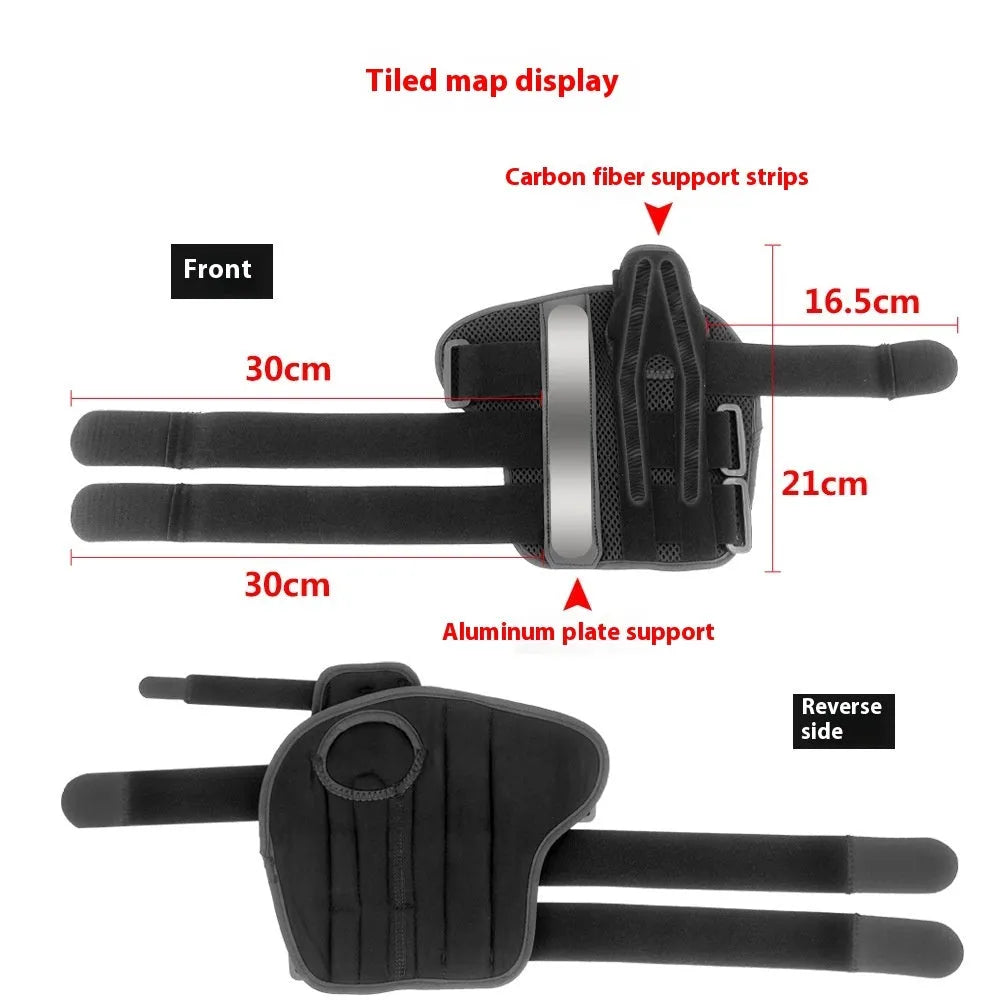 Carbon fibre sports wrist guard with thumb strap in black and grey, shown on a hand.