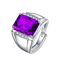 Adjustable geometric copper ring with purple amethyst-coloured gemstones on a white background.