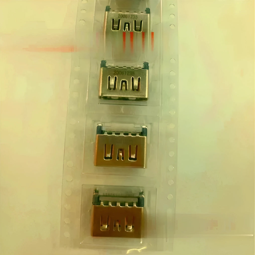 Silver HDMI host socket connector for game console repair.