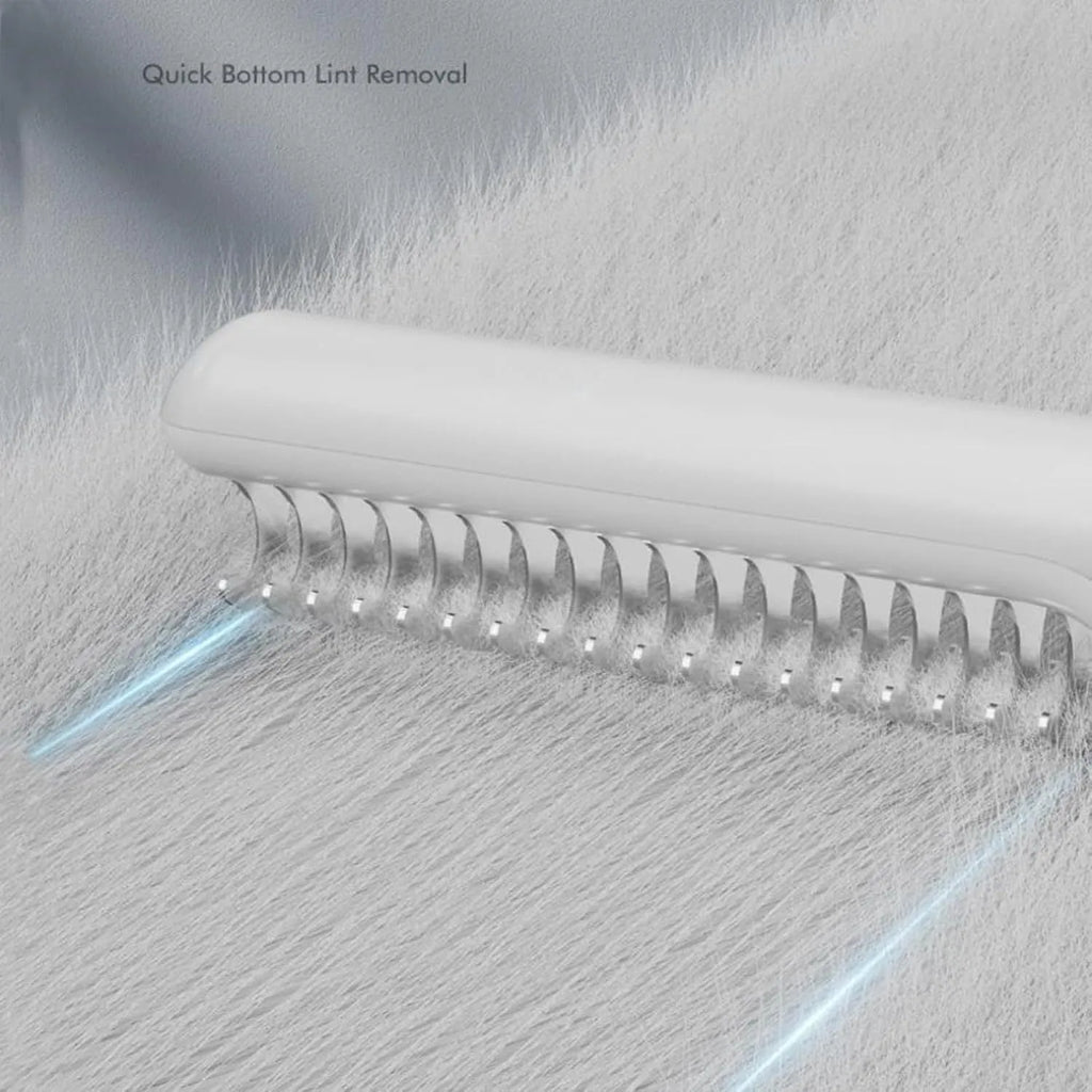 Stainless steel pet dematting comb with ergonomic handle for removing dog hair knots and mats.