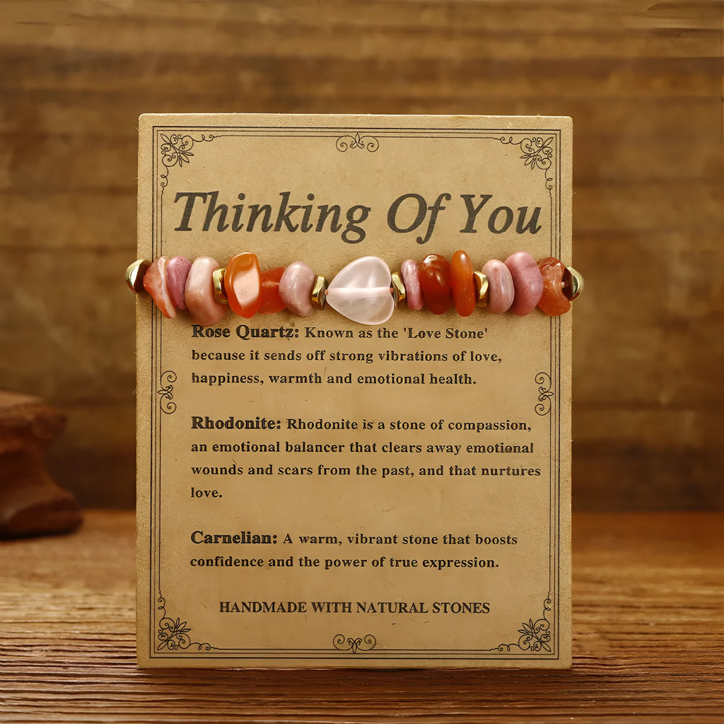 Handcrafted women's stone bracelet with geometric beads on a wrist.