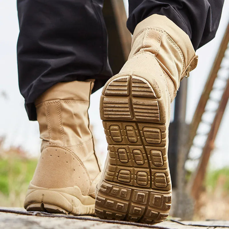Yulong summer tactical desert combat boots in black or sand colour on an outdoor rocky terrain.