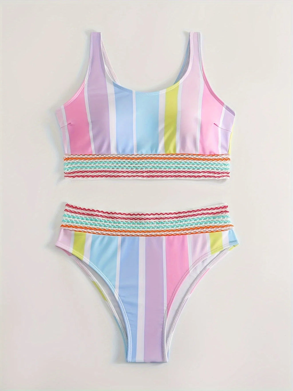 Striped women's sports bikini set with a top and briefs on a white background