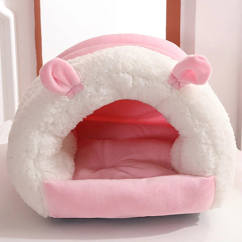 Blue enclosed cat nest with a soft fleece interior and a removable cushion, shown next to a ruler indicating its 40cm by 50cm size.