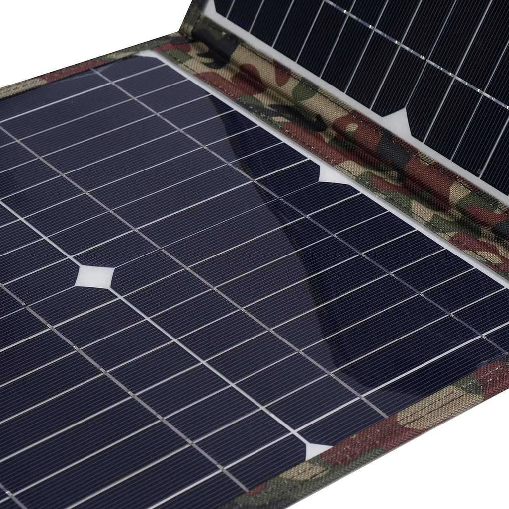 Black foldable portable 36W solar panel unfolded with connected cables and accessories