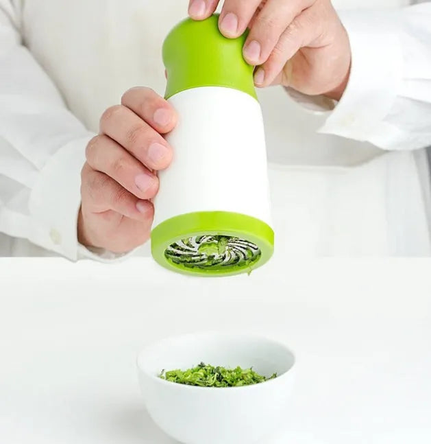 PP plastic and stainless steel herb grinder with removable top measuring 16.5 cm