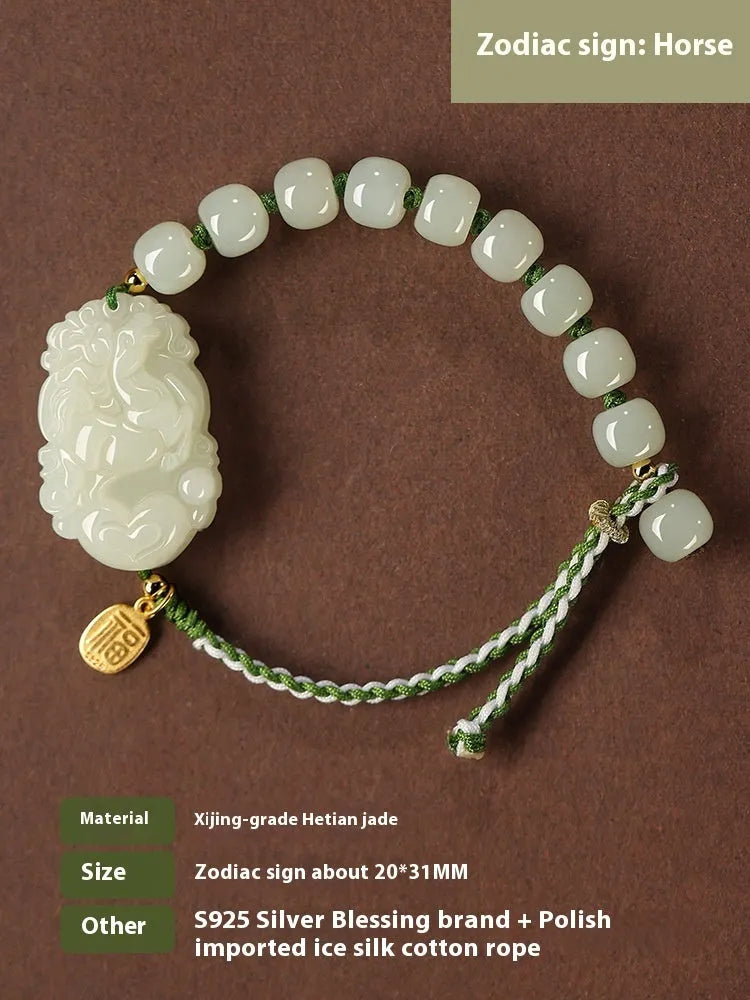 Hetian jade rabbit charm bracelet with sterling silver card on a white ice cotton rope.