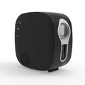 Black and white laser starry sky projection lamp showing nebula moon lights on a wall.