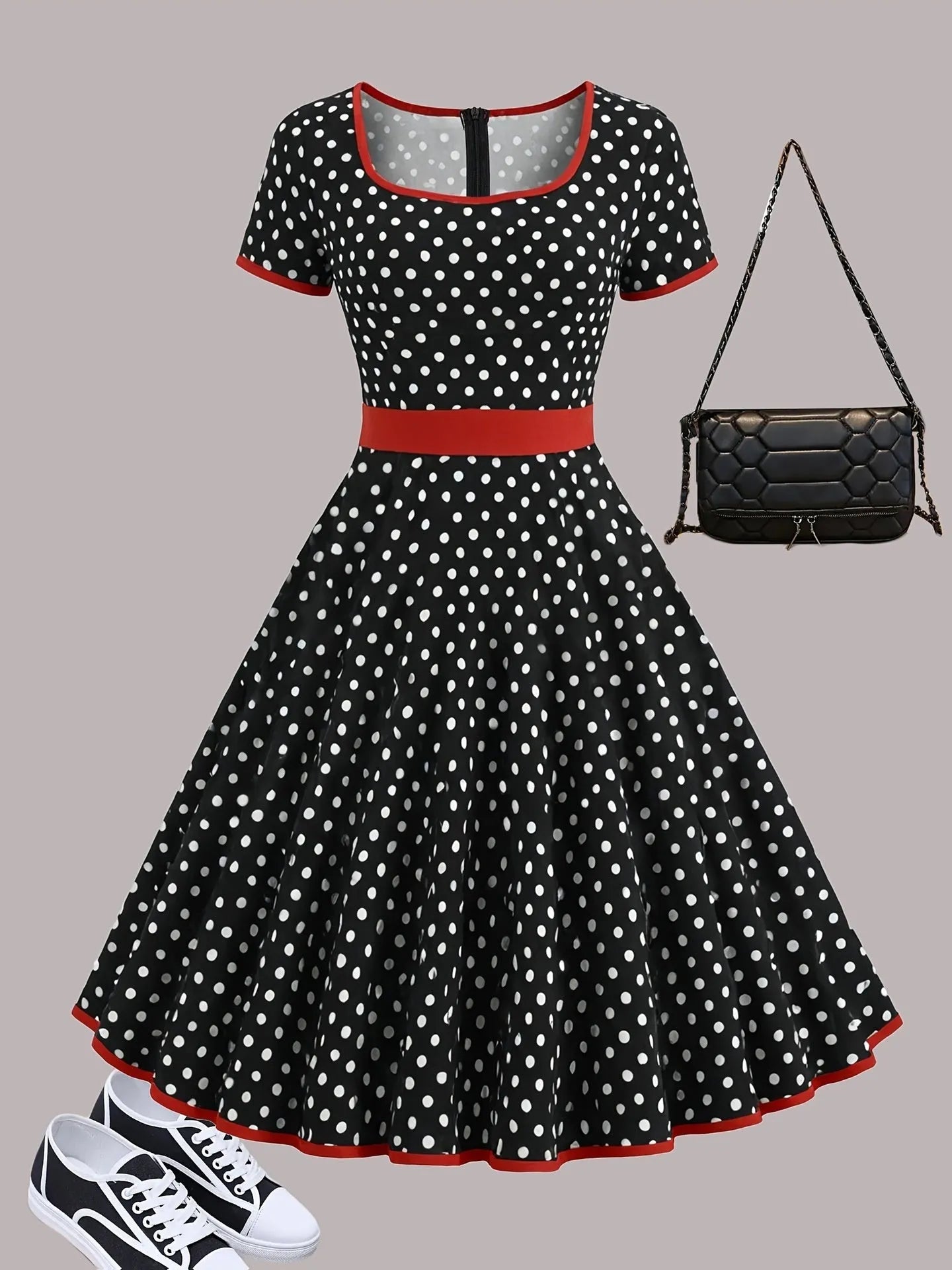 Women's multicolour polka dot pleated dress with a square collar and zip front.