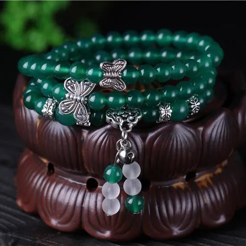 Green multi-layer agate bracelet with three strands of hand-made 6mm beads.
