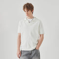 Men's short-sleeved casual polo shirt in a solid colour, showing the knitted fabric and polo collar.